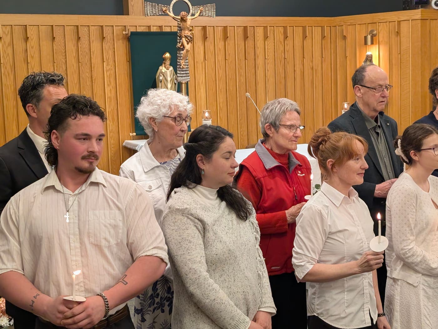 Candidates holding candles at the Easter Vigil